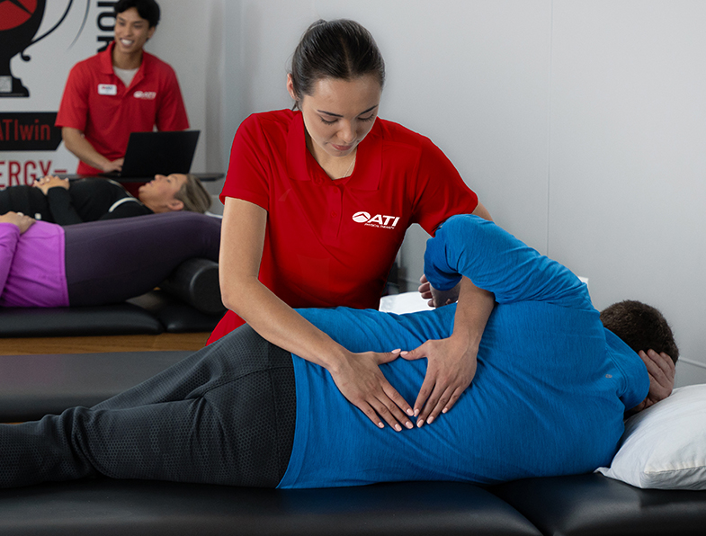 Physical therapy session in progress.