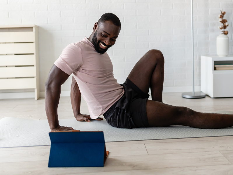 Man taking part in online physical therapy session