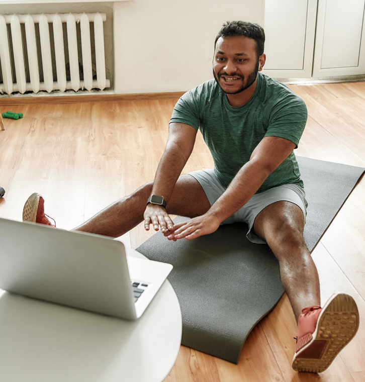 Man engaging in online physical therapy